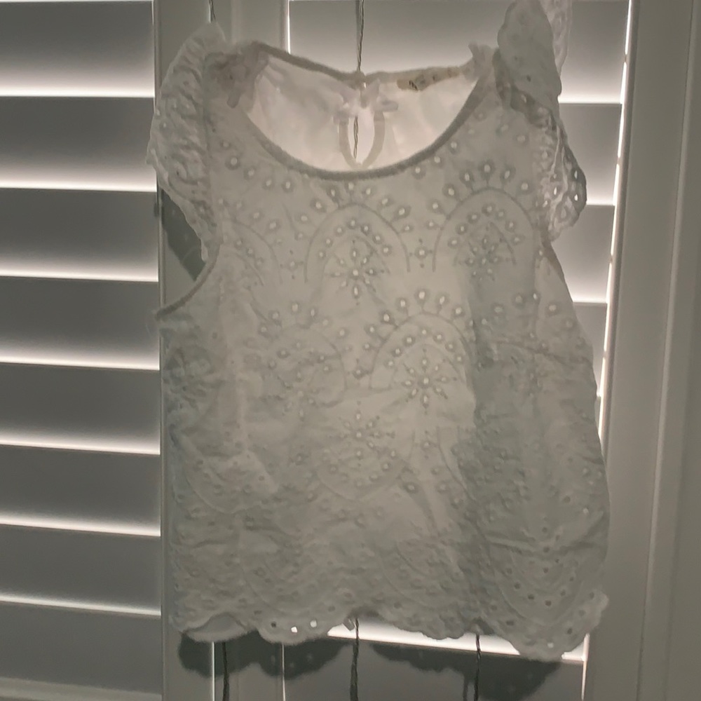 white shirt! perfect with skinny jeans or leggings!
